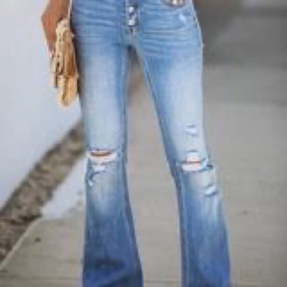 Mid rise button front flare denim jeans